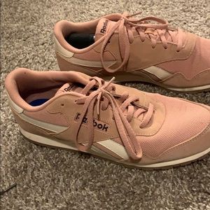 Pink Reebok running shoes